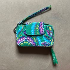 Like New Vera Bradley Wallet With Wrist Strap. Never Used! Green Travel Wristlet With Zipper Pouch, Green Pouch Wristlet For Daily Use, Green Rectangular Wristlet With Zipper Pouch, Trendy Green Rectangular Wristlet, Green Trendy Wristlet For Everyday Use, Trendy Green Wristlet For Everyday Use, Green Travel Bag With Wrist Strap, Green Wristlet For Everyday Use, Green Wristlet With Wrist Strap For Everyday Use