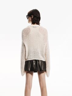 MO&Co. Women's Loose Crochet Knit Sweater Expertly crafted from a cozy cotton blend, this sweater has a delicate crochet knit design that adds a chic with a sheer effect, while the slightly oversized fit provides a flattering silhouette. Perfect for layering and the beige hue pairs well with a leather skirt for a stylish look. Features : - Slightly oversized fit- Crochet knit design with sheer effect- Made from a comfy cotton blend Code: MBD3SWT014The back length of size S is 44cmMATERIALS & CAR Chic Open Knit Sweater For Layering, Chic Cream Open Knit Sweater, Mohair Layering Sweater With Open Knit, Mohair Open Knit Sweater For Layering, Chic Knit Sweater For Layering, Cream Open Knit Sweater For Layering, Winter Crochet Top For Layering With Textured Knit, Winter Textured Knit Crochet Top For Layering, Winter Crochet Top For Layering