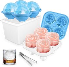 ice cube trays with roses and spoons next to them on a white background