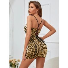 Size & Fit Us- 8/10 (L) Body Measurements Bust 37-39.4" Waist Size 29.1-31.5" Hips 39-41.3" Product Measurements Length 34.3" Bust 31" Waist Size 27.6" Hip 35.8" Leopard Print Criss Cross Backless Cami Dress Color: Multicolor Style: Sexy Pattern Type: Leopard Details: Backless, Criss Cross Type: Cami Neckline: Sweetheart Sleeve Length: Sleeveless Waist Line: Natural Hem Shaped: Pencil Length: Short Fit Type: Slim Fit Fabric: Medium Stretch Material: Polyester Composition: 95% Polyester, 5% Elast Yellow Backless Mini Dress For Date Night, Yellow Stretch Bodycon Dress For Date Night, Yellow Fitted Mini Dress With Spaghetti Straps, Yellow Backless Bodycon Dress, Yellow Bodycon Backless Dress, Yellow Backless Club Dress, Yellow Bodycon V-neck Mini Dress, Shein Dress, Cami Dress