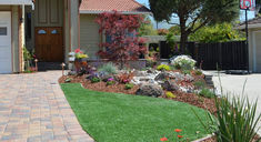 a house with landscaping in the front yard