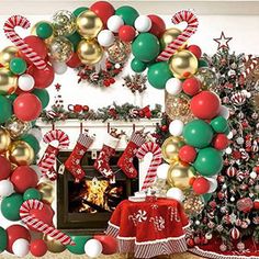 a decorated christmas fireplace with stockings and stockings on it