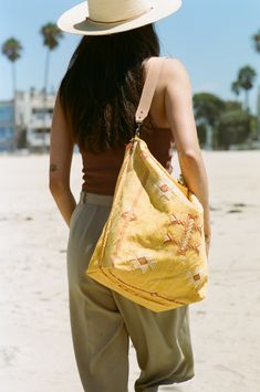 Apricot Moroccan Cactus Silk Tote Yellow Woven Shoulder Bag For Travel, Yellow Hobo Bag For Travel, Yellow Hobo Bag With Handles For Travel, Travel Shoulder Bag In Yellow Woven Design, Yellow Leather Handle Shoulder Bag For Travel, Yellow Beach Bag With Leather Handles, Yellow Beach Bags With Leather Handles, Yellow Hobo Bag With Adjustable Double Handle, Yellow Hobo Bag With Detachable Strap For Travel