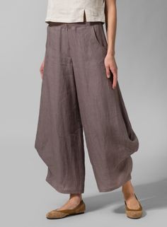 want! Elegant Ankle-length Harem Pants For Loungewear, Chic Harem Pants With Tapered Leg And Pockets, Chic Tapered Leg Harem Pants With Pockets, Chic Relaxed Fit Wide Leg Pants With Side Pockets, Elegant Baggy Solid Color Bottoms, Elegant Baggy Solid Bottoms, Chic Fitted Harem Pants With Pockets, Elegant Baggy Bottoms In Solid Color, Elegant Loose Fit Bottoms For Fall