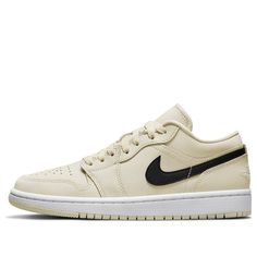 The WMNS Air Jordan 1 Low Coconut Milk is the perfect combination of classic and modern style. Crafted in a low-top silhouette, this shoe has it all: the signature Air Jordan tread, a bright white midsole, a sleek cream color upper and the iconic Nike swoosh symbol prominently featured in black. With its timeless look and superior comfort, this pair of Air Jordans will leave you looking great while you stay comfortable on your feet. Whether you’re running errands or spending the day with friends, these shoes won’t let you down. Show off easy style and get your WMNS Air Jordan 1 Low Coconut Milk today! (AJ1/SNKR/Retro/Low Top/Women's/Non-Slip/Basketball/Wear-resistant) Jordan 1 Low Coconut Milk, Low Top Nikes, Wmns Air Jordan 1, Day With Friends, Easy Style, Air Jordan 1 Low, Jordan 1 Low, Nike Swoosh, Air Jordan 1