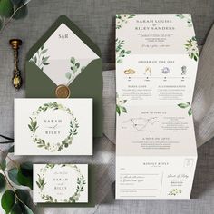 wedding stationery with greenery and white paper