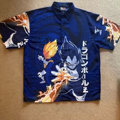 New Without Tags Vintage 2001 Dragon Ball Z Vegeta Shirt (2xl) -Never Washed Or Worn -Extra Button Included On Shirt -Original Owner -Smoke Free & Pet Free Home Create A Bundle To Save A Bundle!! Blue Collared Camp Shirt With All Over Print, Blue Collared Camp Shirt With All-over Print, Blue Short Sleeve Camp Shirt With All Over Print, Blue Relaxed Fit Camp Shirt With All Over Print, Fitted Blue Shirt With All Over Print, Blue Relaxed Fit Camp Shirt With Print, Blue Collared Shirt With All Over Print, Blue Camp Shirt With All Over Print, Blue Shirt With All Over Print And Camp Collar