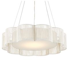 a white chandelier hanging from the ceiling