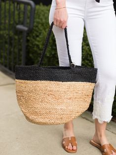 This oversized all natural jute market tote bag is perfectly accented with black banding and handles for a striking look. Handcrafted in natural jute fibers so you can be stylish and sustainable! Jute Totes, Market Tote Bag, Market Tote, Natural Jute, Leather Trims, All Natural, Vegan Leather, Shoulder Strap, Handles