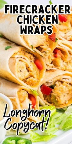 chicken wraps with lettuce and tomato on the side