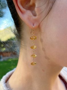 "These lovely handmade citrine drop earrings are made of natural 10mm rondelles and 14kt gold filled wire. I love this length - 2.25\" - because it's just long enough to draw attention without overpowering a look. The stones themselves are gorgeous and bright, with a simple design that allows their beauty to shine.  - Handmade with love and care - 10mm natural citrine rondelle beads  - 14kt gold filled wire" Chip Jewelry, Citrine Drop Earrings, Stone Chips, Citrine Earrings, Citrine Beads, Silver Bead Necklace, Natural Citrine, Design Simple, Gorgeous Earrings