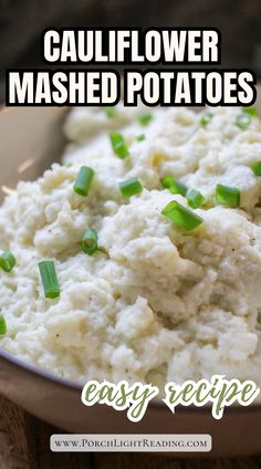 cauliflower mashed potatoes in a bowl with green onions