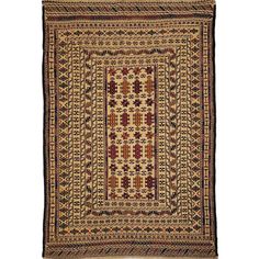 an antique afghan rug with geometric design