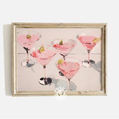 a painting of pink martinis on a white wall