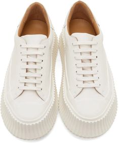 Jil Sander.Off-White Agnellato Oversize Sole Sneaker.Low-top buffed leather sneakers in off-white. Tonal rubberized trim throughout..· Lace-up closure.· Padded collar.· Rubber platform midsole.· Crepe rubber outsole.· Platform: H1.75 in.Supplier color: White.Upper: leather. Sole: rubber..Made in Italy..221249F128002 Padded Cassette Bag, Jil Sander Shoes, White Platform Sneakers, Online Lingerie, Trending Looks, Sole Sneakers, Puma Platform Sneakers, Fashion Street Style, Platform Sneakers