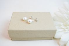 Simple, elegant and classic real pearl stud earrings created with white 5.5mm ROUND genuine freshwater pearls and nickel-free sterling silver stud posts. These are perfect earrings to coordinate with any of the 5.5mm pearl bracelets or necklaces in my shop. This size is appropriate for adults who want a smaller everyday pearl or older children age 6 and up (choking hazard for young children). Arrives on an earring card tucked inside a small gift box. O T H E R . O P T I O N S ~Gold-filled posts: Nickel Free Minimalist Pearl Earrings Gift, Minimalist Nickel-free Pearl Earrings Gift, Classic Pearl White Pearl Earrings For Gift, White Hypoallergenic Pearl Earrings For Gift, Minimalist Hypoallergenic Pearl Earrings For Gifts, Hypoallergenic White Pearl Earrings As Gift, Minimalist White Pearl Earrings For Anniversary, Classic Sterling Silver Pearl Earrings Gift, Silver Minimalist Pearl Earrings For Gift