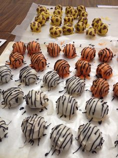 there are many desserts on the table ready to be cut into pieces and put together