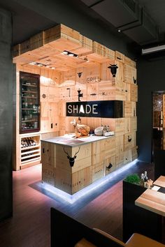 an image of a kitchen with wooden walls