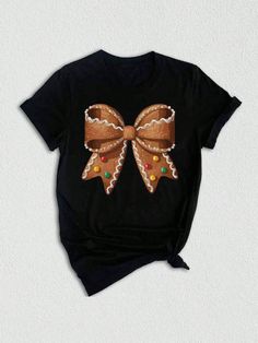 Get into the festive spirit this season with our uniquely designed Christmas Bow Shirt! This Coquette Christmas tee is perfect for anyone wanting to spread holiday cheer. Featuring an enchanting Christmas Bow design, this shirt radiates warmth and joy, making it an ideal choice for all your festive gatherings. Looking for the perfect Christmas shirt to gift a loved one? This Christmas Bow Shirt is an excellent choice and serves as a thoughtful Christmas gift or holiday gift that's sure to delight. Its playful combination of coquette charm and Christmas cheer makes it stand out among all Christmas shirts. Whether you're cozying up in a Christmas sweatshirt or dressing it down with denim, this bow shirt is versatile for any occasion. Pair it with our adorable Gingerbread Coquette style for a Gingerbread Shirt, Coquette Christmas, Shirt Coquette, Bow Shirt, Coquette Style, All Christmas, Thoughtful Christmas Gifts, Bow Shirts, Christmas Bow