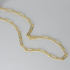 Very trendy at the moment - paperclip necklace. It's dainty and great layered or alone. Made of 925 Sterling Silver Plated in a THICK plating of 14k Gold for a piece that will last you years to come 16" Chain + 2.5" Extension chain Lobster Clasp Closure Nickel-free and hypoallergenic Thickness: 3.7mm Opal Stacking Ring, Sterling Silver Opal Ring, Paperclip Necklace, Gold Bar Earrings, Dainty Hoop Earrings, Chain Necklace Gold, Silver Opal Ring, Simple Stud Earrings, Gold Link Chain