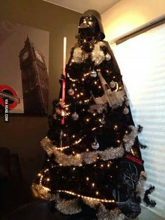 a star wars christmas tree with lights on it and the words best xmas tree ever