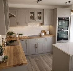 the kitchen is clean and ready for us to use in its new owner's home