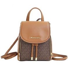 Michael Kors Phoebe Medium Zip Pocket Backpack Luggage/Brown MK Signature Logo **Brand New, in sealed package with tags. 100% Authentic Michael Kors** • Medium Size Backpack  • Brown and Luggage Signature Leather • Flap Drawstring and Zipper • Gold-tone hardware  • 11.75”W X 13”H X 5.25”D  • Handle drop: 3.25”  • Adjustable Straps: 12.5”-14.75”  • Exterior details: 2 front side zip pockets  • Interior: Padded slip pocket, Zip pocket, Front slip pockets  • Lining: 100% polyester  • Zipper closure Michael Kors Brown Casual Bag, Casual Brown Michael Kors Bag, Michael Kors Brown Backpack For On-the-go, Michael Kors Brown Backpack With Zipper Closure, Michael Kors Brown Standard Backpack, Brown Standard Backpack With Branded Hardware, Brown Backpack With Branded Hardware, Backpack Luggage, Exterior Details