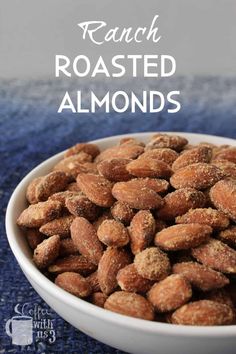 roasted almonds in a white bowl with text overlay reading ranch roasted almonds