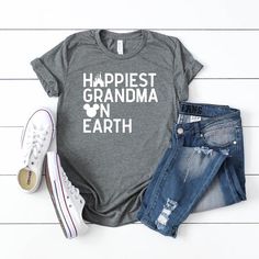 Our new Happiest Grandma on Earth tee is perfect for all grandmas who are going on a Disney vacation or cruise! You'll love wearing this super soft tee while enjoying a day at the Happiest Place on Earth! This shirt makes a great gift for all grandmas who are going on a Disney trip! This t-shirt is everything you've dreamed of and more. It feels soft and lightweight, with the right amount of stretch. It's comfortable and flattering for both men and women. FABRICATION• 52% airlume combed and ring Disney Maternity, Baby Announcement Shirts, Funny Pregnancy Announcement, Disney Vacation Shirts, Disney Trip Shirts, Disney Mom, Womens Disney Shirts, Funny Dog Shirts, Happy Mama