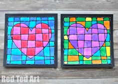 two pieces of stained glass with hearts on them