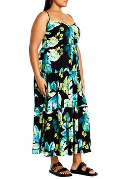 Channel bright, summery style in this relaxed maxi dress featuring a delightful tropical pattern. V-neck Adjustable straps Smocked back Unlined 100% viscose Machine wash, line dry Imported Tropical Oasis, Maxi Sundress, Tropical Pattern, Printed Maxi, City Chic, Tropical Print, Sundress, Smocking, Oasis