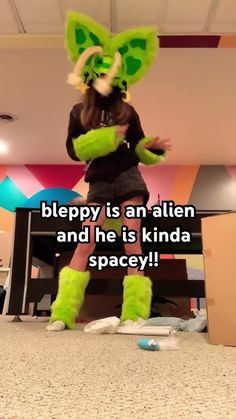 a woman in an alien costume standing on the floor