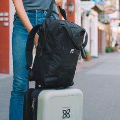 With three-in-one functionality as a backpack, crossbody or tote, the best-selling Camden does it all. This convertible bag has a large capacity that can handle those “just in case” items. Made from recycled material, the Camden features two water bottle holders, a padded laptop sleeve and a luggage pass-through. The perfect “personal item” for air travel, the Camden is sure to be your new travel favorite! Suitcase Handle, Convertible Backpack, Convertible Bags, Water Bottle Holders, Air Travel, Classic Backpack, Backpack Straps, Bottle Holders, Wide Straps