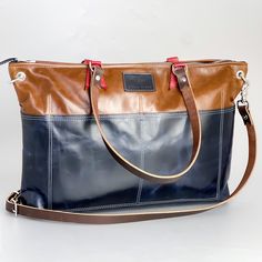 Our Everyday Collection of handbags reflects our task, offering tried + true styles + combinations that are timeless + classic. Colors + sizes to keep up with your effortless style + quality that holds up to your everyday adventures. Bring style back to business with The Brief. Featuring a large interior pocket on one side, this briefcase is perfect for anything from your laptop to “old school” folders. An adjustable cross body strap and two signature pockets on the other side complete this vers Timeless Tote Briefcase For Everyday Use, Timeless Everyday Briefcase Tote, Chic Everyday Satchel With Luggage Sleeve, Chic Black Briefcase For Everyday Use, Timeless Black Satchel For Everyday Use, Chic Travel Briefcase With Leather Lining, Timeless Bags With Luggage Sleeve For Everyday Use, Timeless Bag With Luggage Sleeve For Work, Timeless Bags With Luggage Sleeve