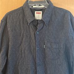 Levi’s Men’s Modern Fit Quilted Button Down Shirt Shacket In Gray. Striped Interior Lining. Quilted Without Being Too Thick. Brand New With Tags. Measures 32 Inches In Total Length And 22 Inches Pit To Pit. Size Men’s Large. Levi's Long Sleeve Shirt With Pockets, Levi's Collared Shirt With Button Closure, Classic Levi's Shirt With Buttons, Striped Interior, Burgundy Shirt, Levis Vintage Clothing, Levis T Shirt, Levis Shirt, Button Up Shirt Mens