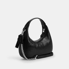 Patent leather Inside zip pocket Zip-top closure fabric lining Handles with 5 drop Detachable strap with 23 1/2 drop for shoulder or crossbody wear 7 3/4 (L) x 4 (H) x 2 1/2 (W) Style No. CW036 Evening Bags With Zipper Pocket, On-the-go Baguette Bag With Zipper Pocket, Evening Hobo Shoulder Bag With Zipper Pocket, Evening Shoulder Hobo Bag With Zipper Pocket, Crossbody Bag Coach, Coach Outlet, Mini Crossbody Bag, Mini Crossbody, Black Cross Body Bag