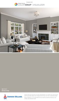 a living room with gray walls and white furniture