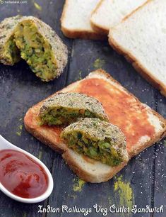 bread with pesto on it next to a bowl of ketchup and two pieces of bread