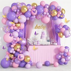 a birthday party with balloons and decorations