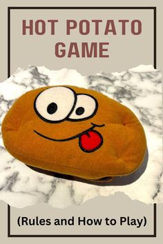 a close up of a stuffed animal on top of a white surface with text reading hot potato game rules and how to play