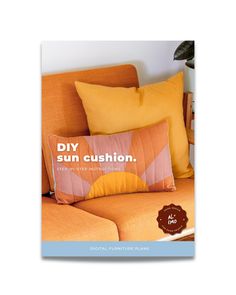 an orange couch with pillows on it and the words diy sun cushion written in brown