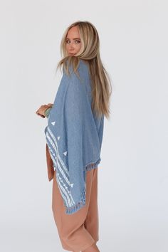 The Fallon Embroidered Sleeve Poncho you know and love, but NOW offered as the Fallon Embroidered Sleeve Tassel Poncho! We know you'll love wearing this poncho because it features: Lightweight flowy woven fabric Flowy poncho silhouette (no sleeves, edges tacked with a small seam) So cute embroidered geometric shapes along bottom edge Finished with a cute tassel bottom edge Comfortable boho outfit you'll love pair with: Floral Cut Out High Neck Bralette, Delaney Distressed Wide Leg Pants, Sunburs Boho Outfit, Boho Outfits, Geometric Shapes, Fabric Care, Leg Pants, Woven Fabric, Wide Leg Pants, Bralette, So Cute