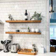 the kitchen counter is clean and ready to be used for cooking or serving dishes,