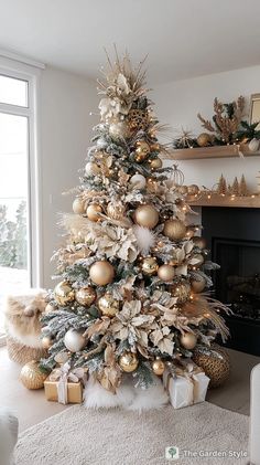 a decorated christmas tree with gold and silver ornaments