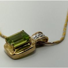 This is part of Chairish’s Fine Jewelry assortment.  14k Yellow Gold & Peridot Pendant & Necklace. Weight: 5 grams Weight of Chain: 3.2 grams Weight of Pendant: 1.8 grams  Chain Lth: 16 in.  Peridot: approx. 8.09 mm x 6.27 mm Peridot Necklace Pendant, Formal Yellow Gold Peridot Necklaces, Formal Yellow Gold Peridot Necklace, Formal Peridot Pendant Necklace, Formal Peridot Gemstones For May Birthstone, Fine Jewelry Peridot Necklace For Anniversary, Gold Peridot Necklace For Formal Occasions, Gold Necklace With Peridot For Formal Occasions, Yellow Gold Peridot Gemstone Jewelry