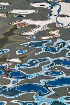 an image of water that looks like it has been painted with blue and white colors