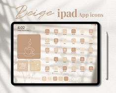 the ipad app icons are displayed on a tablet screen with a pen and coffee cup