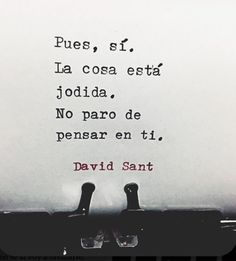 an old typewriter with words written in spanish on the paper next to each other