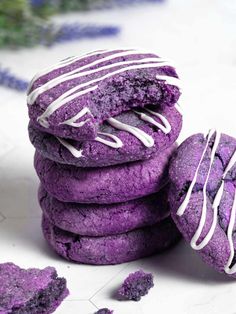 purple cookies stacked on top of each other with the words how to make ube cookies