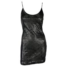 Presenting a stunning black metallic Gianfranco Ferre mini dress. From the 1990s, this mini slip dress, featuring a scoop neckline and thin spaghetti straps, shines with a lightweight eyelet black base covered in transparent round paillettes. Sexy and perfect for a glamorous night out, this dress is an irresistible addition to any high-end wardrobe. Approximate measurements: Size - removed Bust: 30 - 36" Waist: 28 - 34" Hips: 38 - 44" Shoulder to hem:32" Materials tag removed 90s Bodycon Dress, Gianfranco Ferre, Mini Slip, Mini Slip Dress, Black Metallic, Lady Dior, Bodycon Mini Dress, Scoop Neckline, Day Dresses